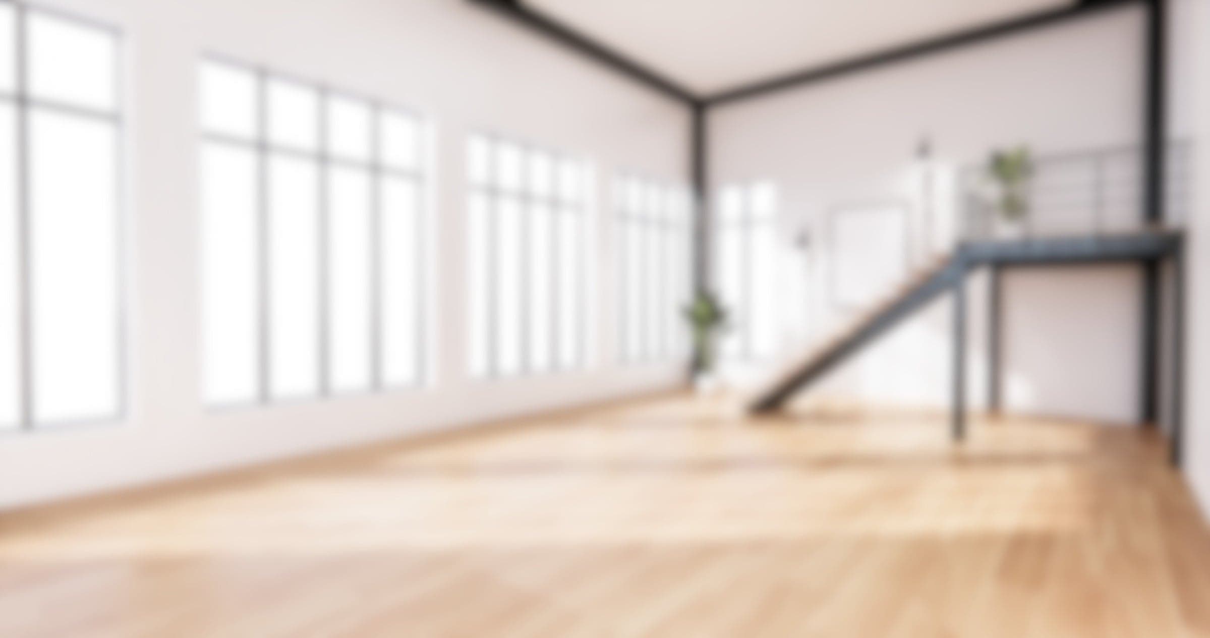 Bright open room with a pale hardwood floor